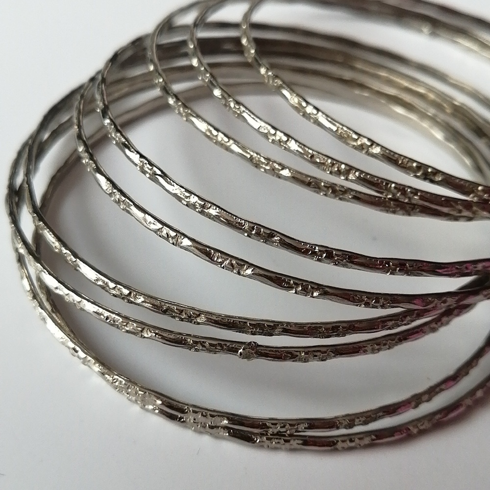 Stacking Bangle Bracelets Silvertone Textured Set of 9